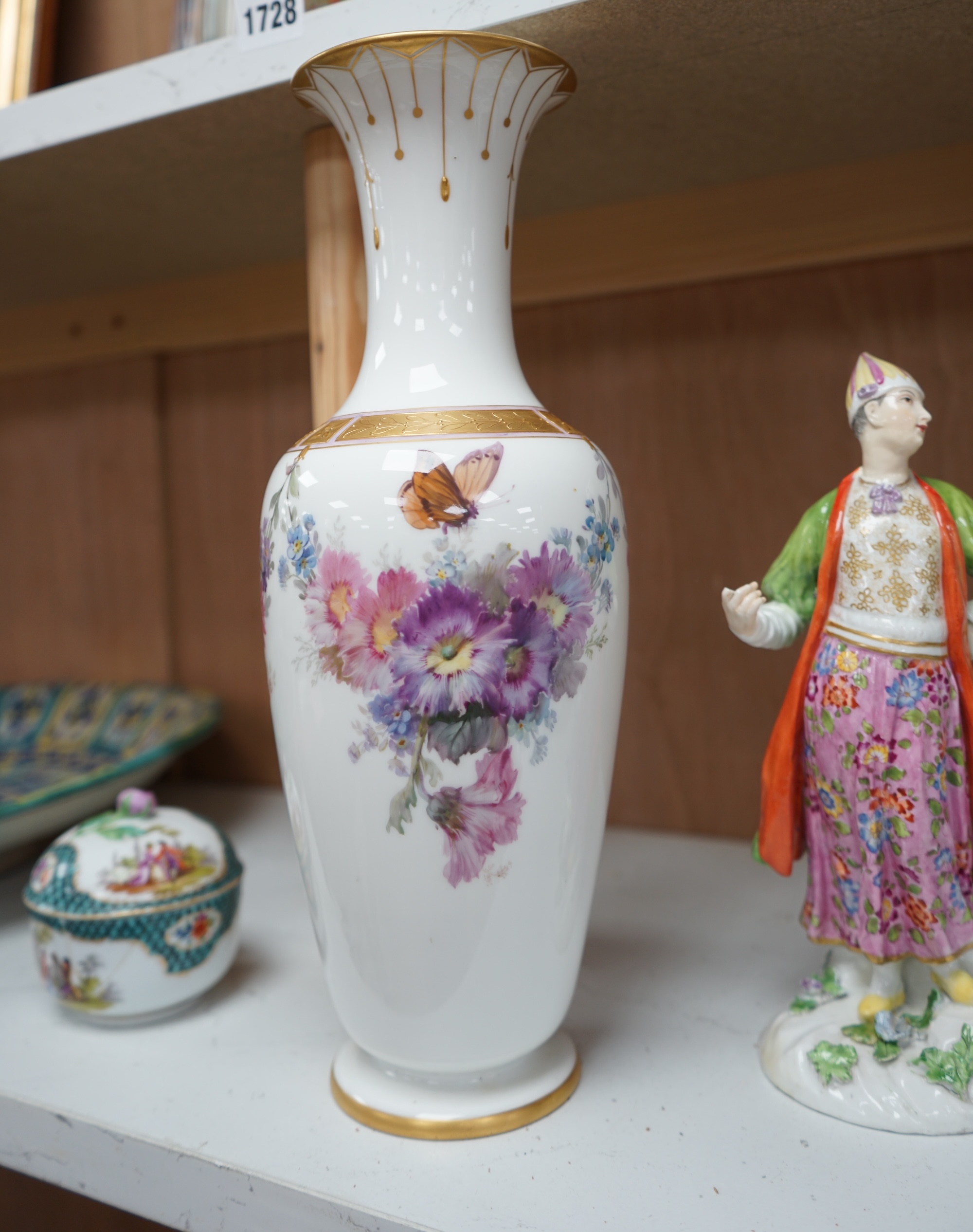 A group of various ceramics to include a Berlin floral decorated vase, a pair of Meissen dishes, similar box and cover, figural sweetmeat and figure of a Turk, together with a pair of Japanese Imari dishes, tallest 33cm.